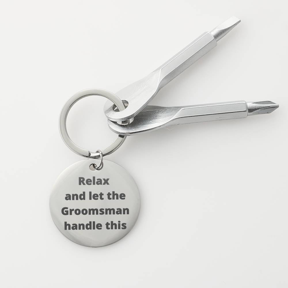 Funny "Relax and let the Groomsman handle this" wedding gift tool key chain. "