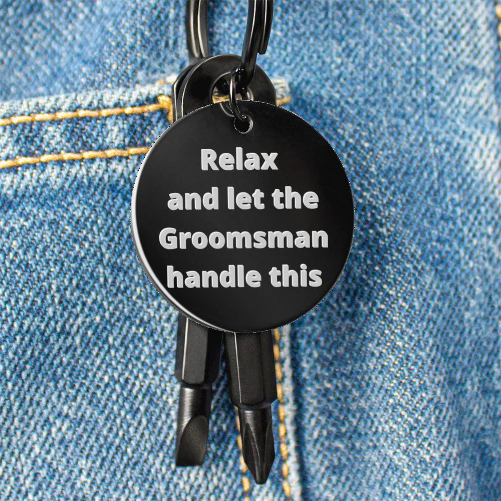 Funny "Relax and let the Groomsman handle this" wedding gift tool key chain. "